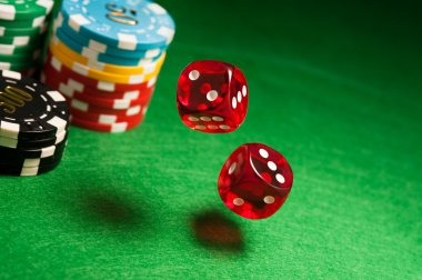 Mobile phone displaying live roulette table with betting layout and real-time stream